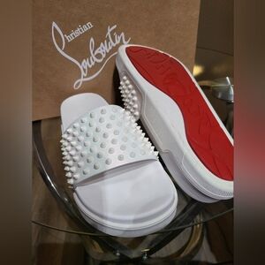 Authentic Christian Louboutin Pool Spiked Slides #40 Worn once, great condition.